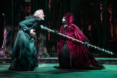 The Witch (Natalie Weiss, right) casts her spell on the Mysterious Man (Larry Yando) in Paramount Theatre’s Into the Woods.