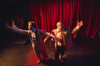 The Con is On in Neo-Futurist's "Trust Us/Screw You"