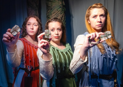 Caty Gordon, Jennifer Mohr, and Jamie Redwood are in “What the Weird Sisters Saw” at The Edge Off Broadway Theater in Chicago through April 14.