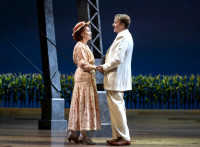 Under the water tower in The Music Man at Goodman Theatr: Monica West (Marian Paroo) and Geoff Packard (Harold Hill) .